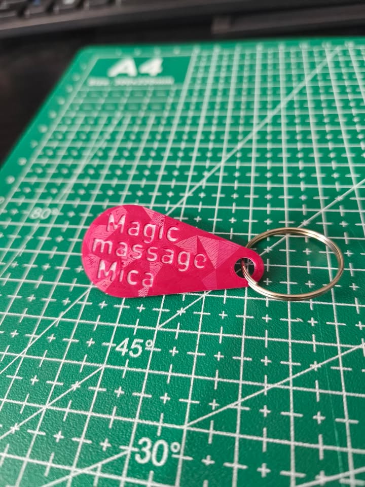 Roze promotivni privezak Magic Massage Mica